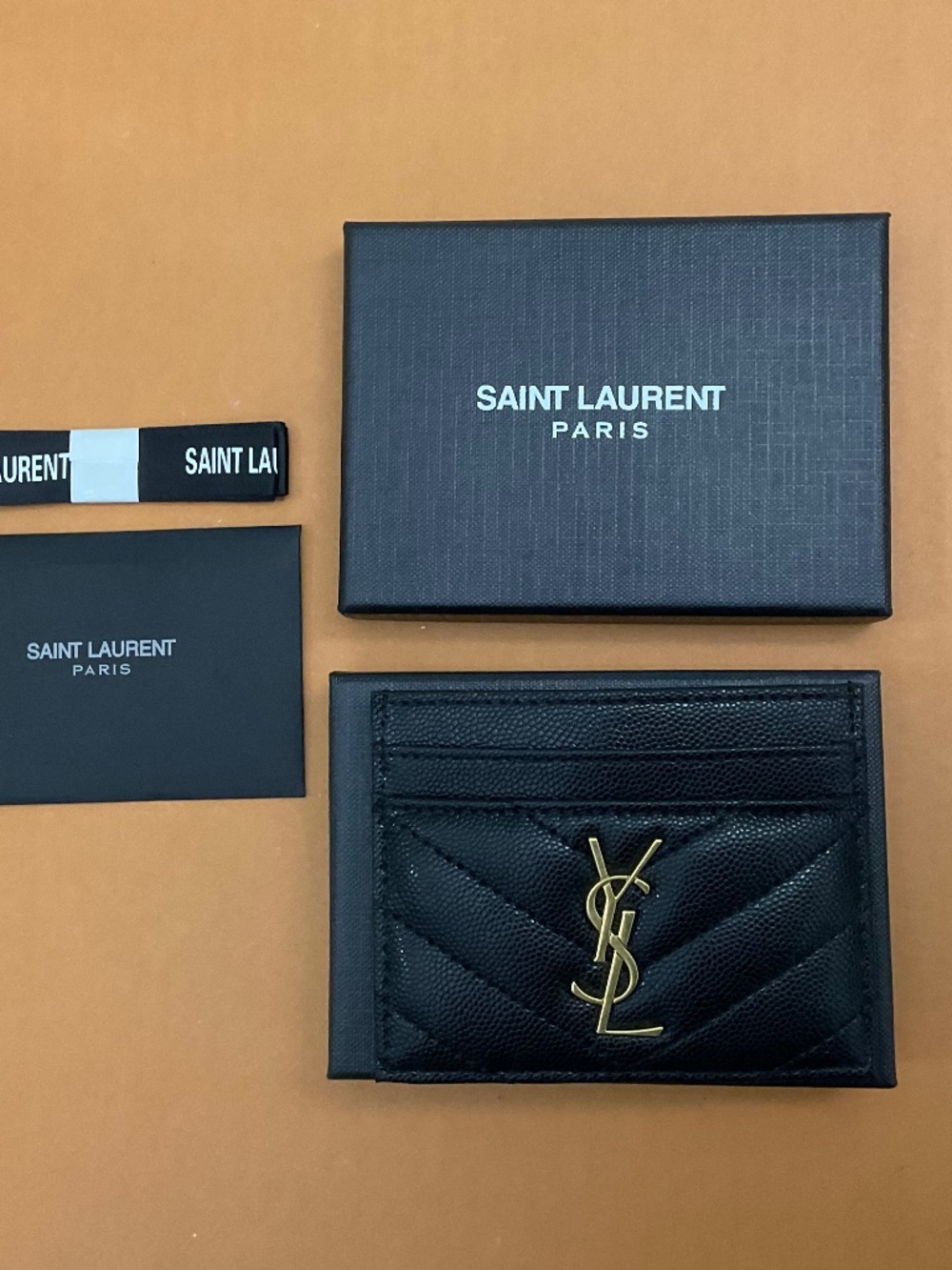 Authentic Yves Saint Laurent YSL Black leather gold Card holder.